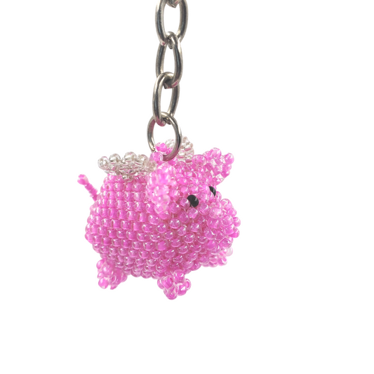 TRIBAL ROOTS Flying Pig Keychain